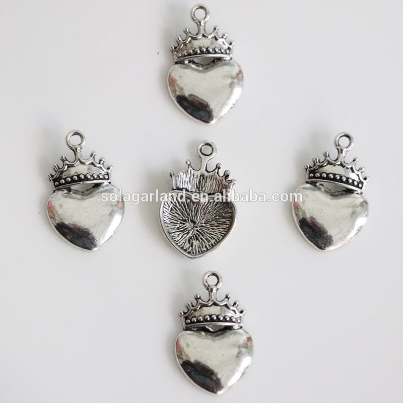 Dije Corazón con corona de metal Dije - Accesorios Rubi